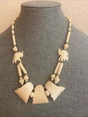 Vintage 70s Trunks up Elephant Carved Bone Necklace